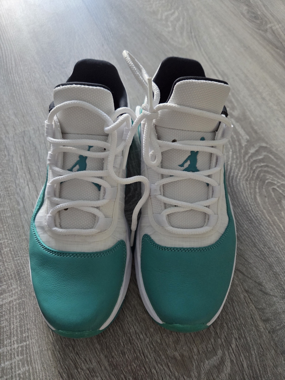Jordan. Air Jordan 11 CMFT Low "Emerald" sneakers